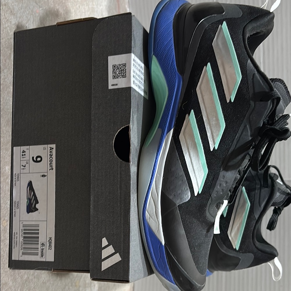 Adidas Black and White Athletic Shoes with Blue Accents
